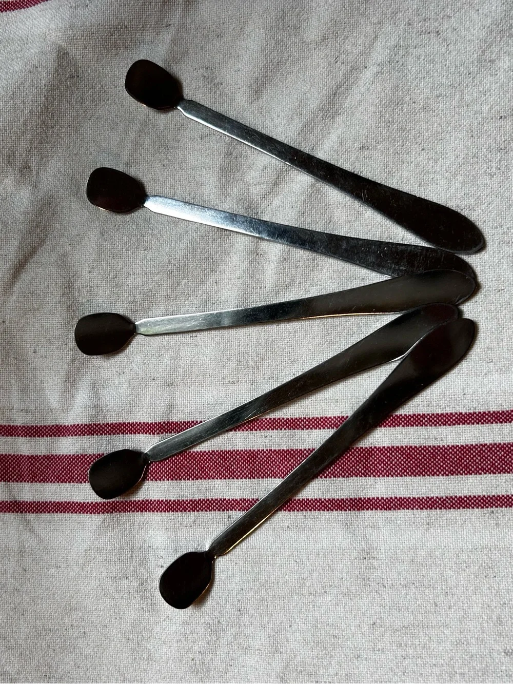 Set of five vintage Sveico stainless drink/coffee stirrers. Made in Sweden.
